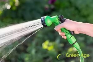 garden-hose-with-spray-nozzle-6-essential-cleaning-tools-and-supplies-for-maintaining-balcony-gardens-in-singapore-balcony-garden-greenage-landscaping-services-singapore