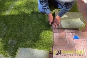 laying-the-grass-diy-guide-6-simple-steps-for-installing-fake-grass-greenage-landscaping-services-singapore